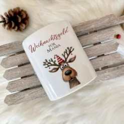 Weihnachtsgeld Spardose mit Rentier und dem Namen personalisiert